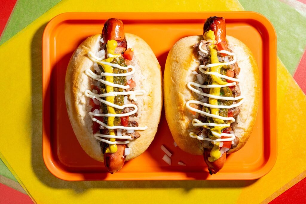 Bacon-wrapped Sonoran Hot Dog with pinto beans