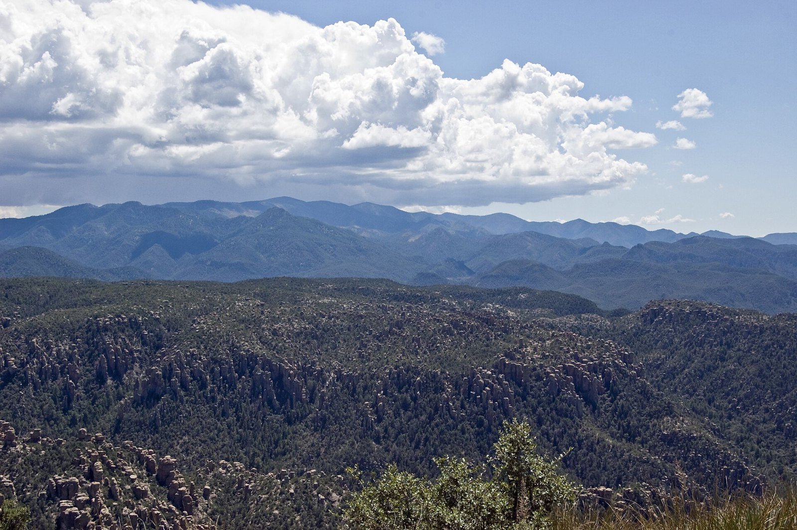 The Chiricahua Mountains and Turkey Creek caldera under a cloudy sky