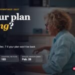 Older woman comparing Medicare Advantage plans on a laptop at her kitchen table, with text: Is your plan ending?