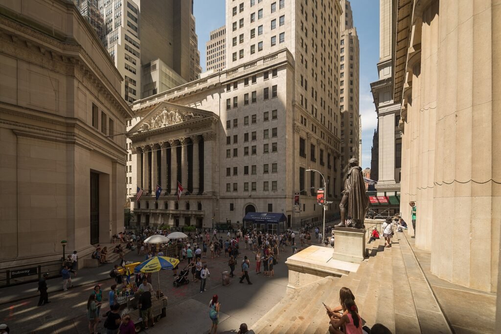 The New York Stock Exchange building on Wall Street in New York City on a sunny day