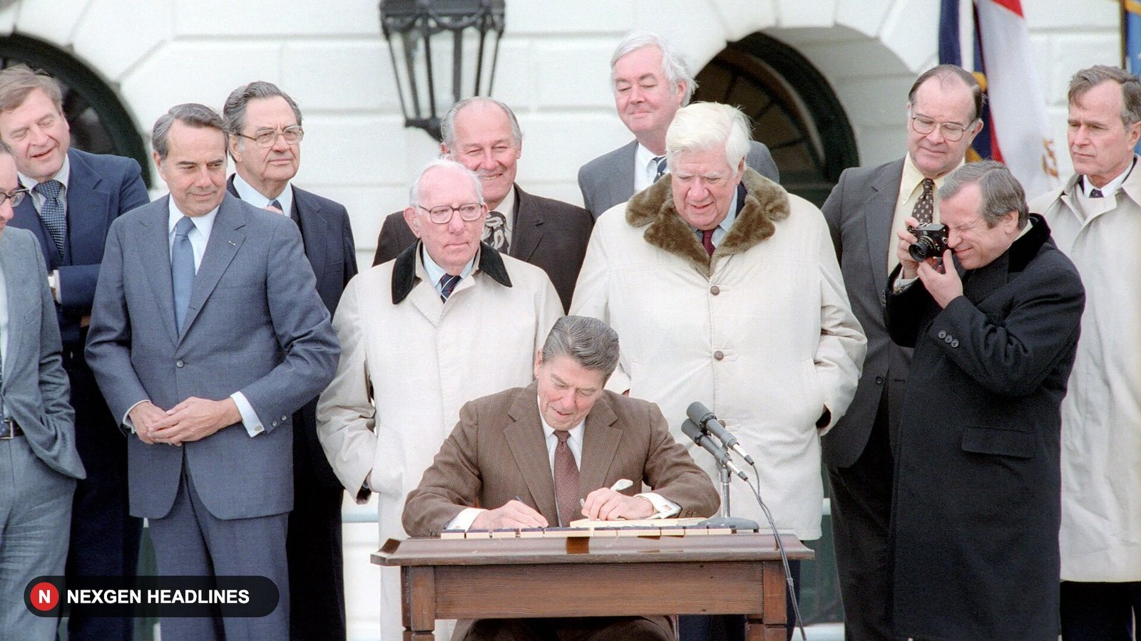 President Ronald Reagan signs the Social Security Amendments of 1983 on the White House South Lawn