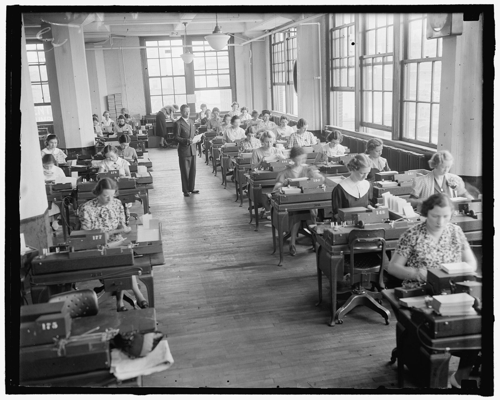Clerks at typewriters in the Social Security records office in Baltimore in the 1930s
